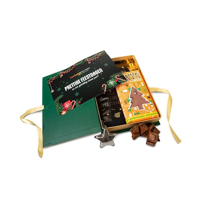 Kerstboek met difuser en thee