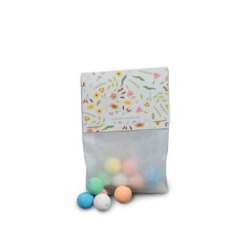 Kleurrijke zaadbollen in biozakje